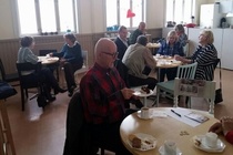 Kerholaiset kahvihetkellä UNCANISSA